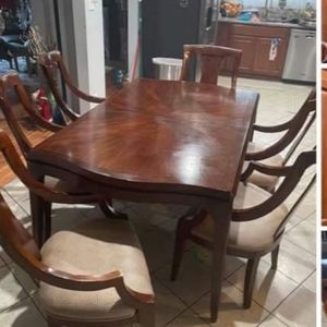 Beautiful table with 4 chairs and curio